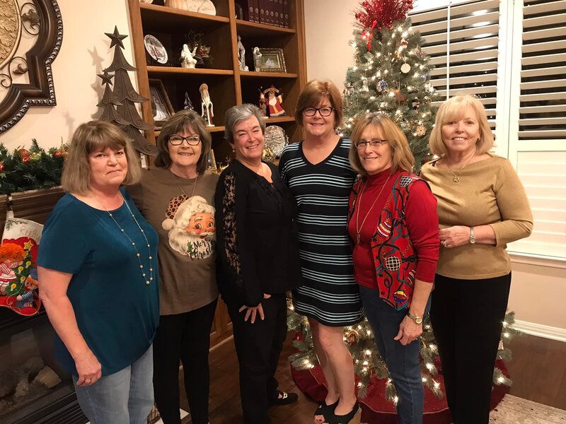 Title Toters celebrate with a successful Christmas party--a fun evening with great food and friendship.  